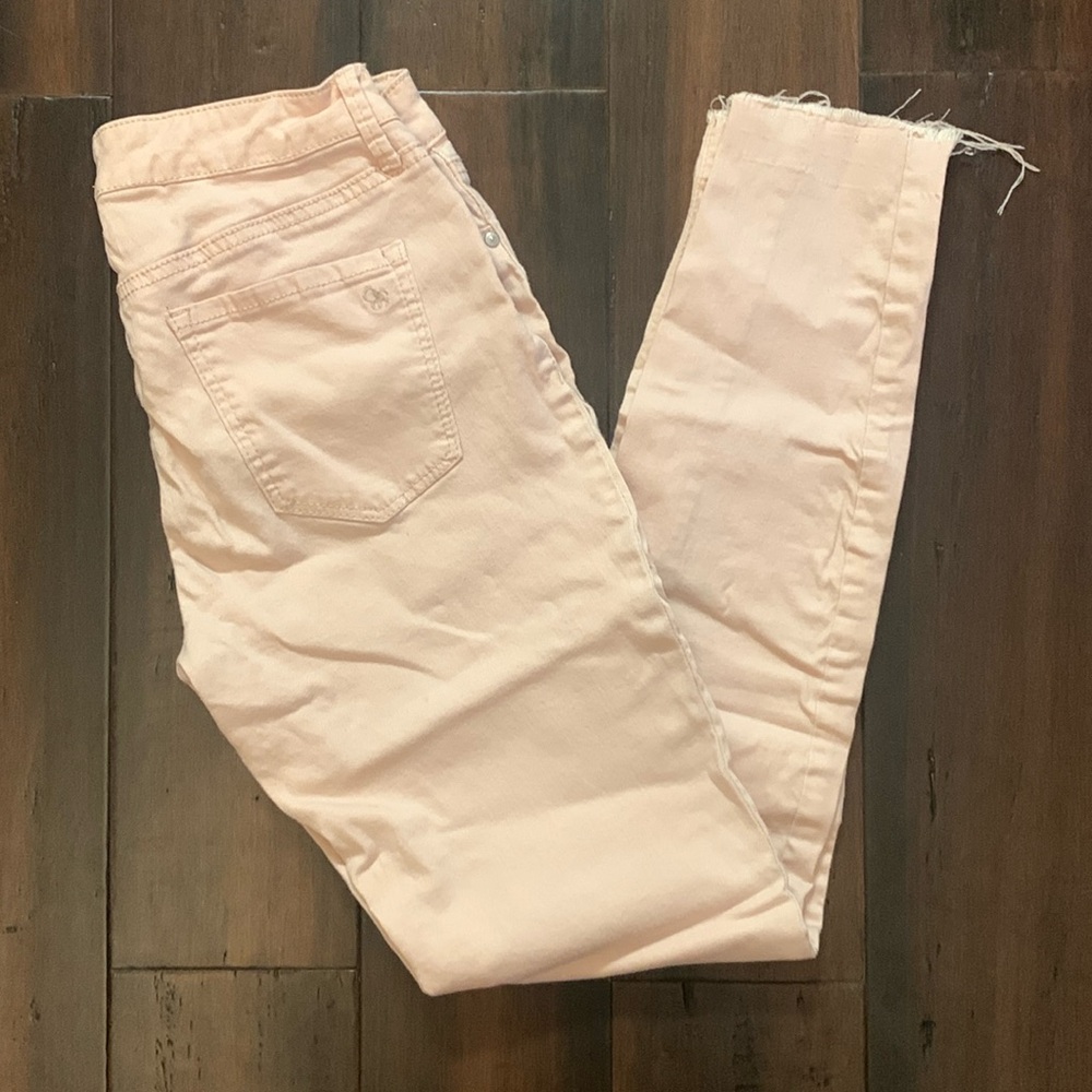 Size 28 Jessica Simpson skinny jeggings. Pale pink.
